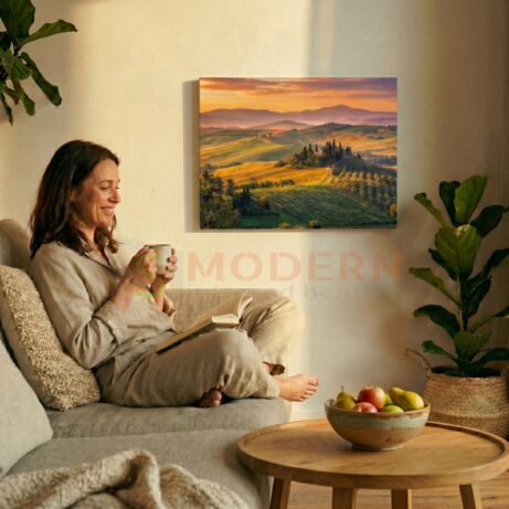 Žena oddychujúca v&nbsp;obývačke, ktorú príjemne ohrieva sálavé teplo z&nbsp;infrapanelu SMODERN®. Ideálne riešenie pre studené nohy a&nbsp;zdravé kúrenie.